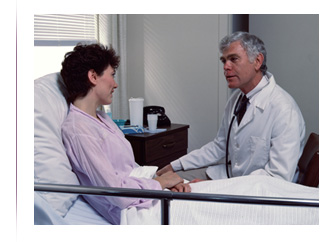Photo of a person caring for a patient.